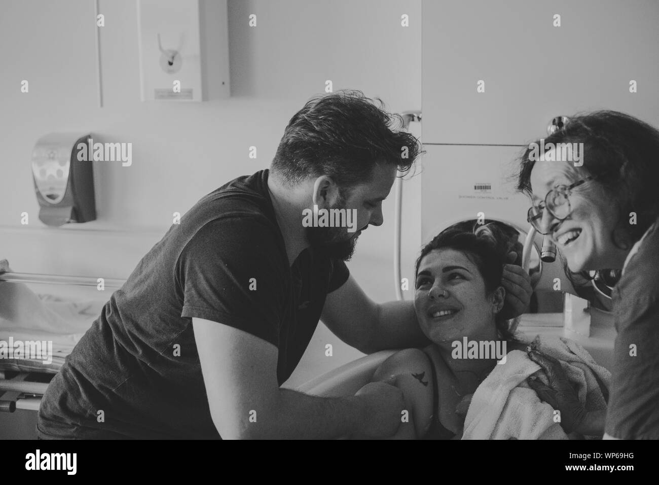 Authentic birth images, woman giving birth in pool Stock Photo Alamy