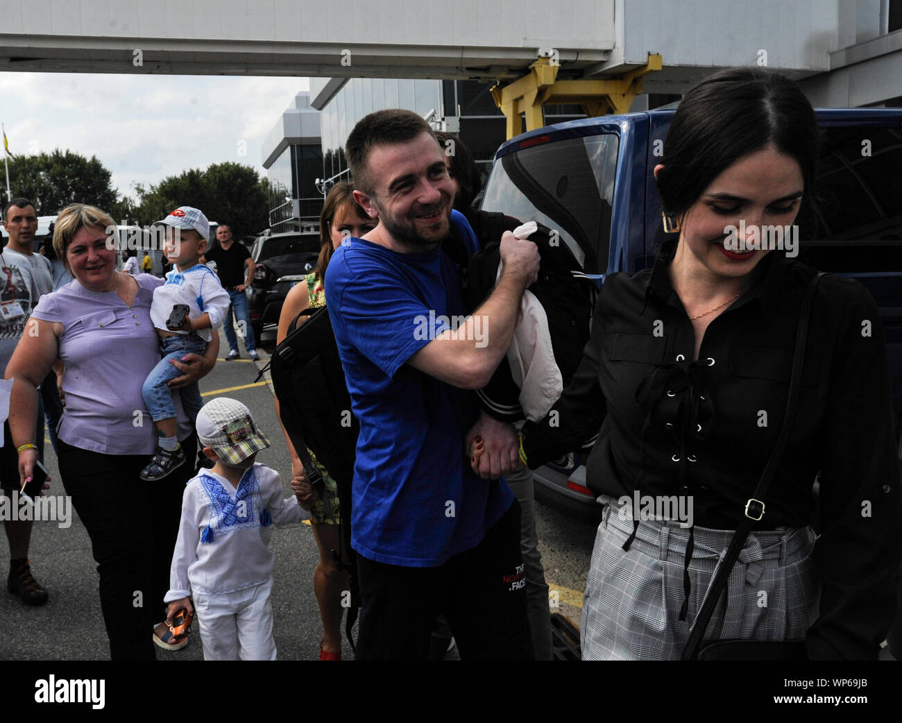 Relatives meet former Ukrainian prisoners freed by Russia at Boryspil International Airport after the exchange of prisoners between Russia and Ukraine.An airplane with liberated Ukrainians landed at Boryspil International Airport. Between Ukraine and Russia held an exchange of withheld persons in the format of 35 to 35. Stock Photo