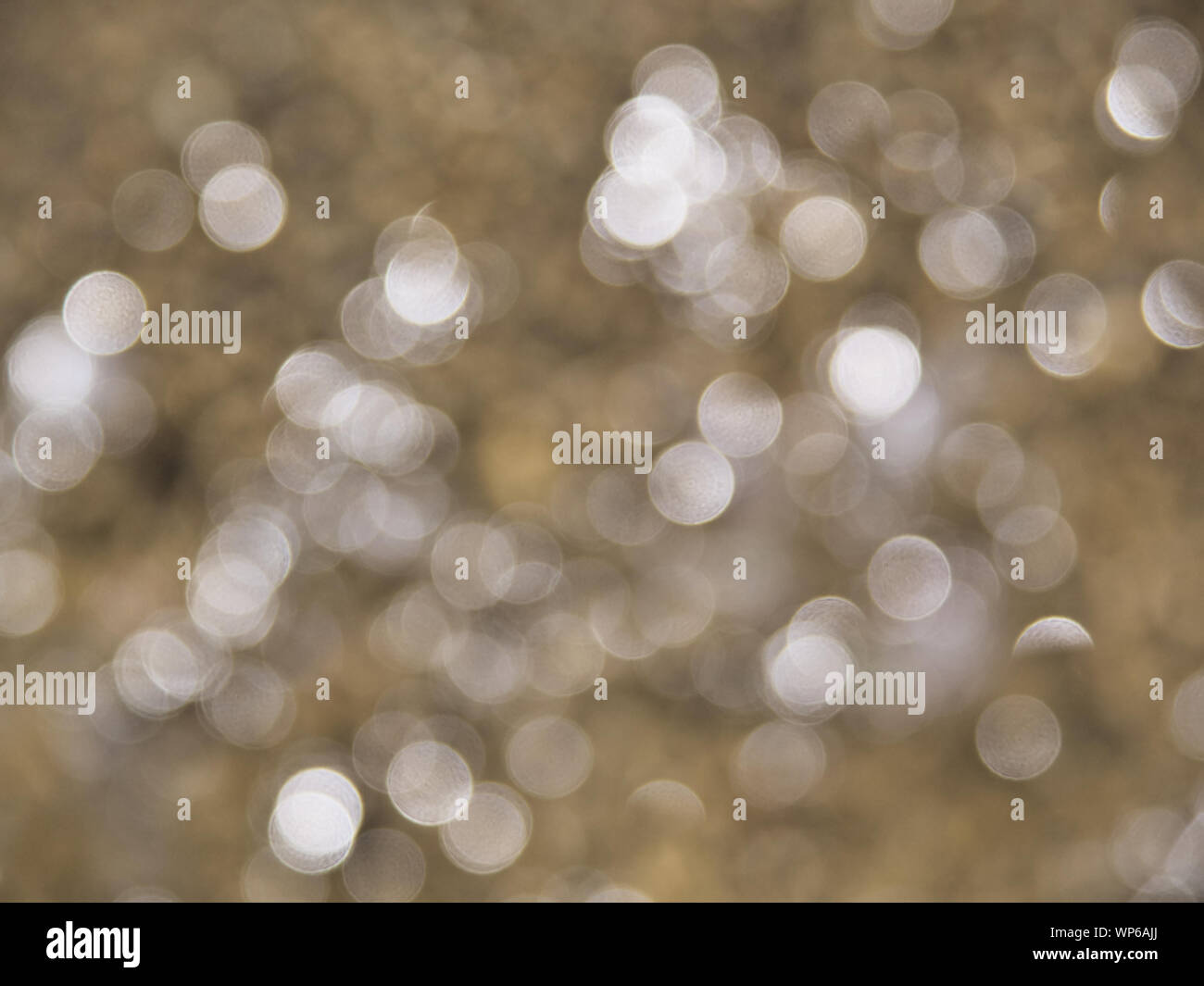 Defocused abstract blurred image with sparkle circular light reflections. Nice bokeh effect. Stock Photo