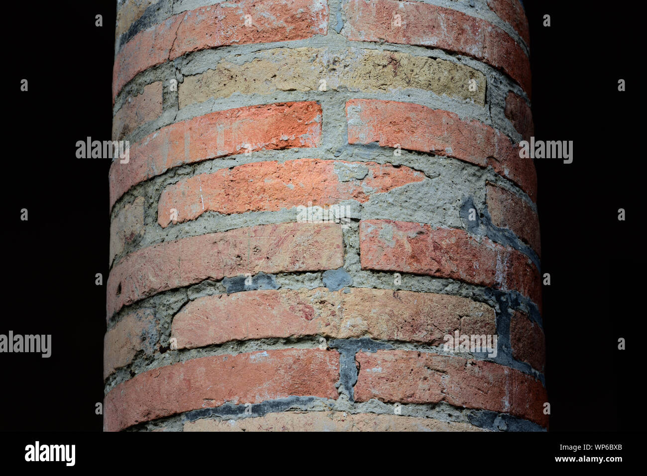 Close-up and detail of a brick red brick pillar Stock Photo
