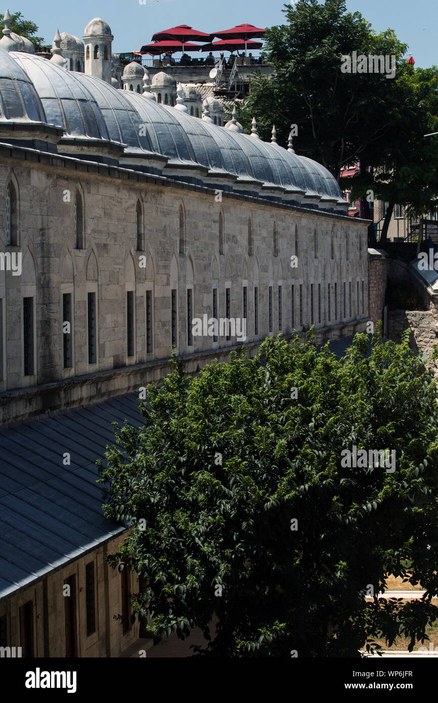 A series of domes and the façade of the exterior buildings of the Suleymaniye Mosque complex, which in the past was used for higher education of scien Stock Photo