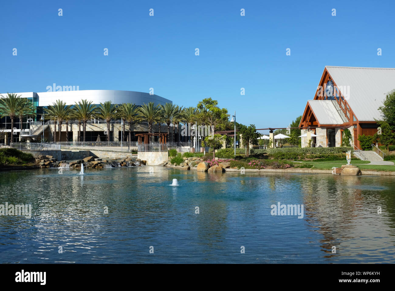 IRVINE, CALIFORNIA - SEPT 7, 2019: The lake with the Worship Center and Chapel at Mariners Church, a non-denominational, Christian Church. Stock Photo