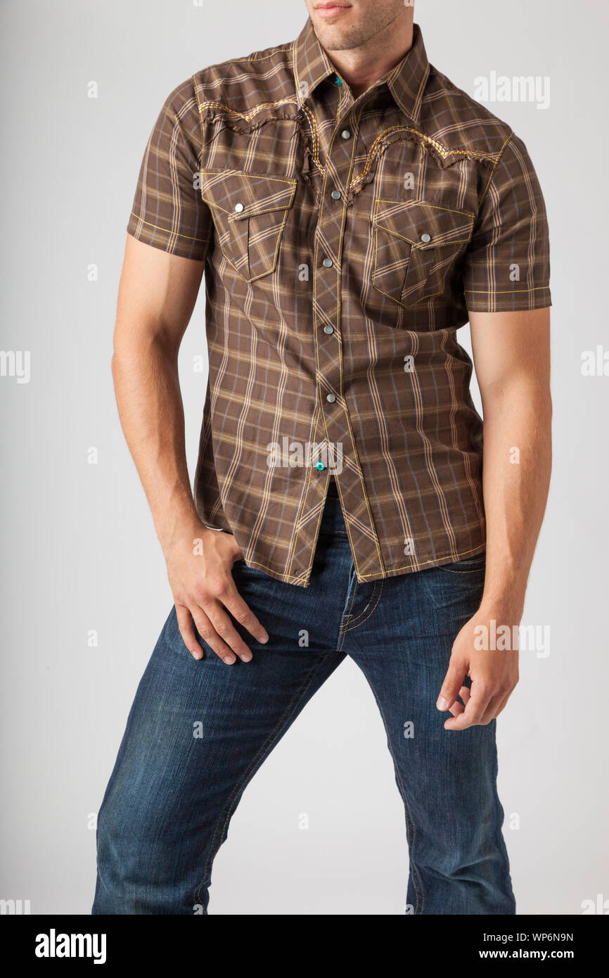 Man wearing western wear shirt and jeans. Young men's casual clothing  fashions styles Stock Photo - Alamy