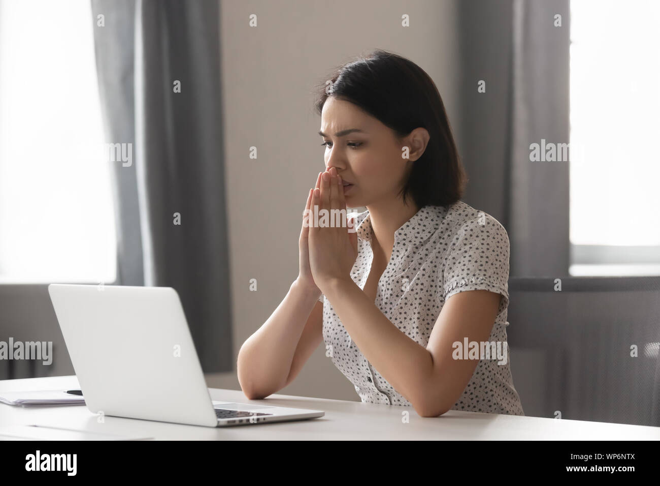 Stressed upset manager thinking about problem solution. Stock Photo
