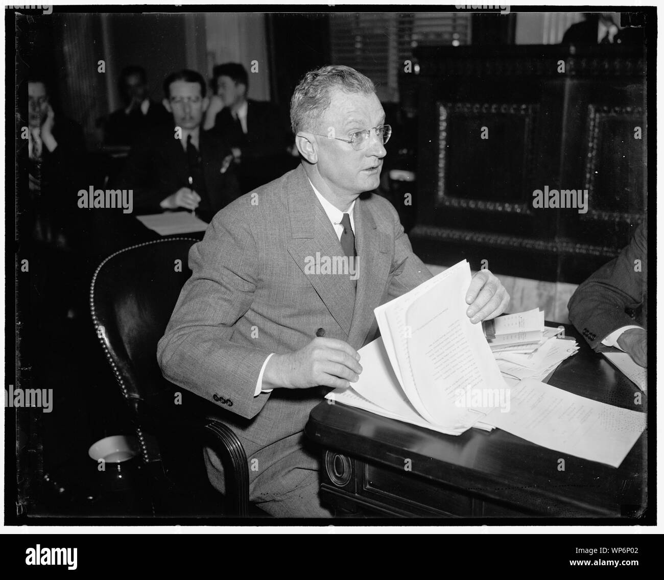 Labor Leader before La Follette. Washington D.C. Homer D. Sayee, Executive Officer of the National Trades Association told the Senate Committee on Civil Liberties that on all strikes where they moved in the association took complete control even to the settling of the strikes, furnishing protection, guards, strike breakers, and under- cover agents during the disputes Stock Photo