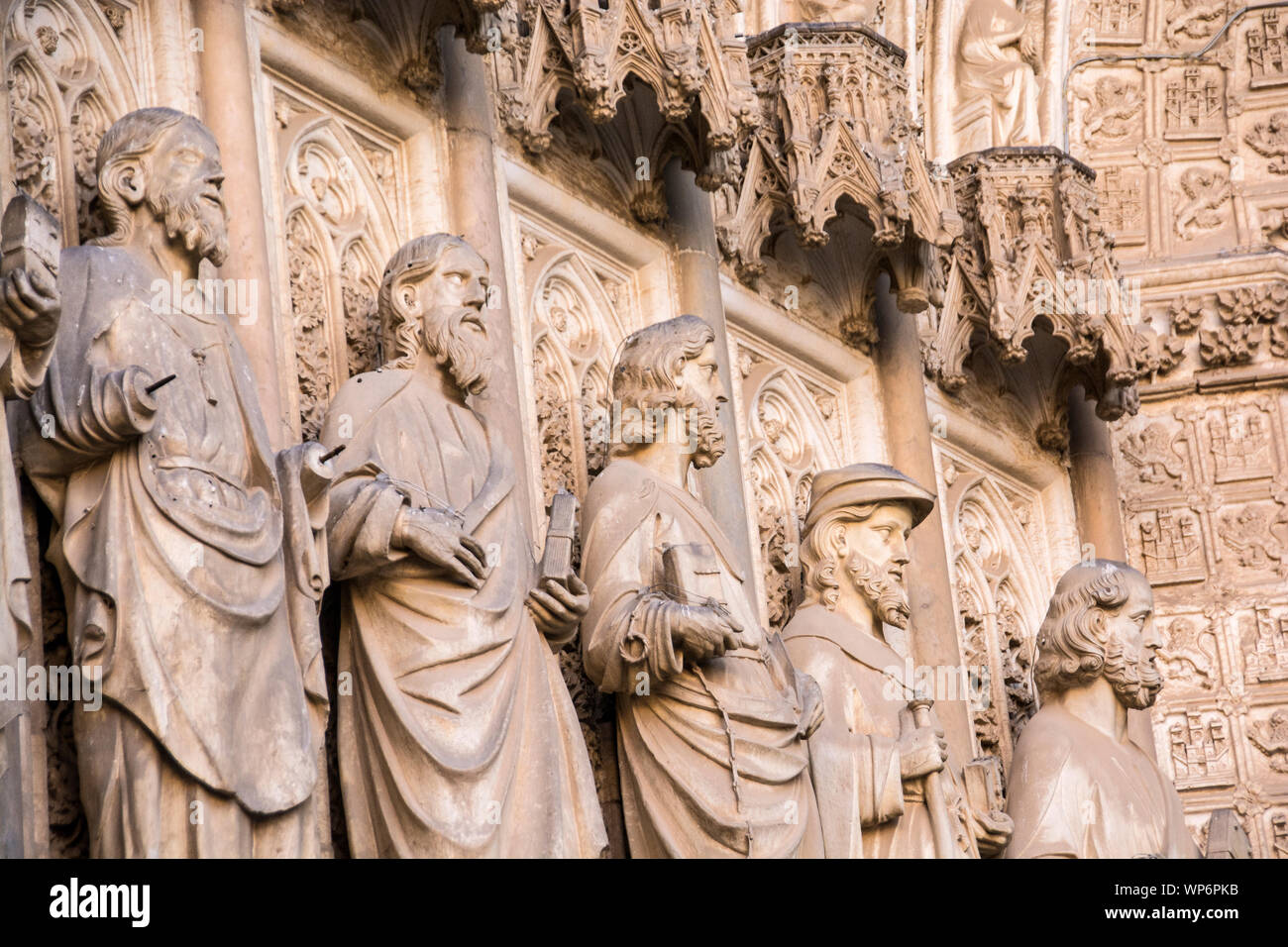 A row of saints outside on the exterior facade of the Toledo Cathedral, Toledo, Spain. Stock Photo