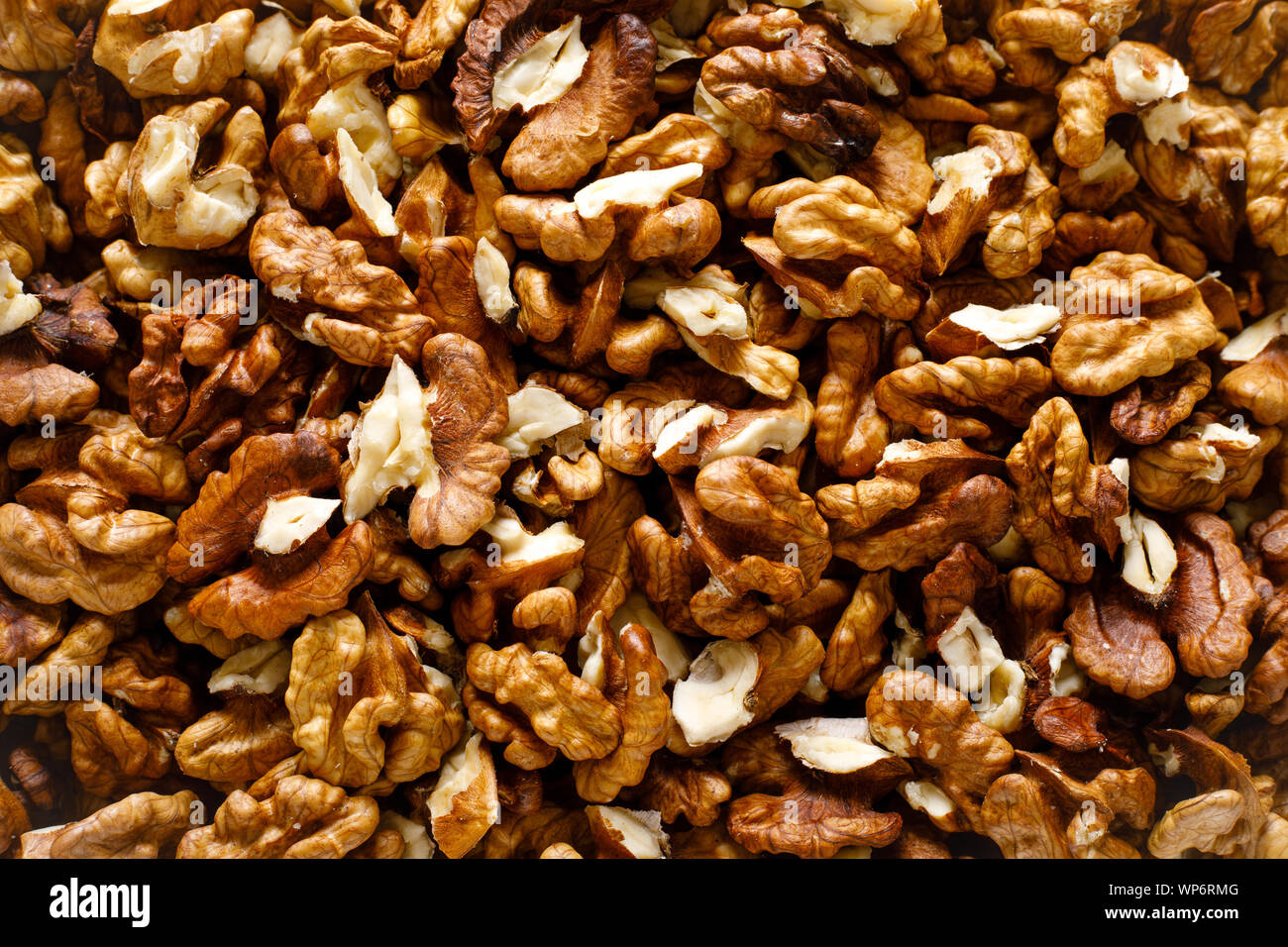 Walnuts. Kernels nuts background, top view Stock Photo