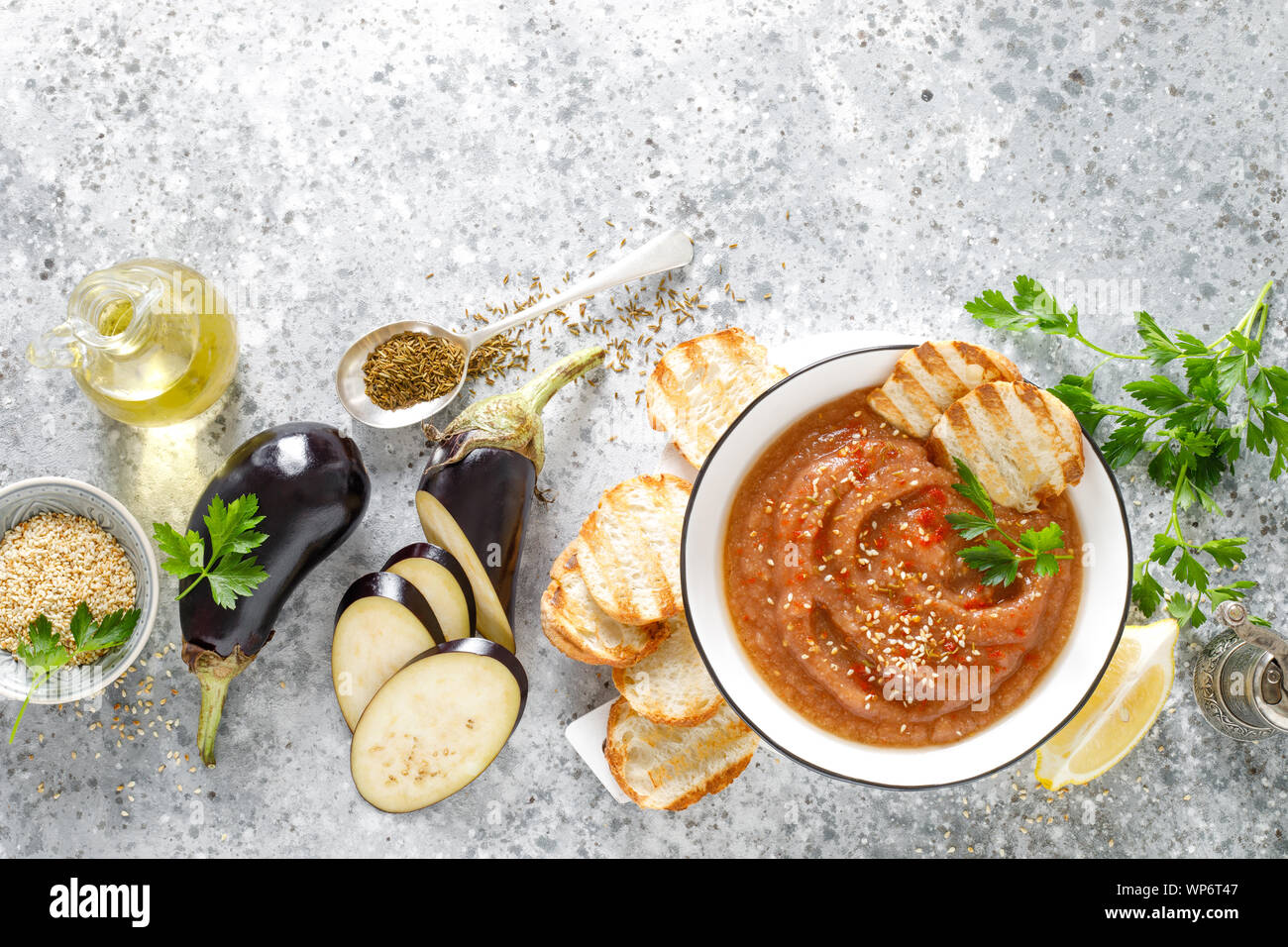 Eggplant hummus with ingredients for cooking. Traditional vegan arabic