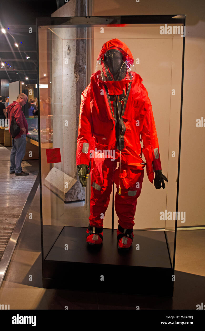 Escape Suit, MK9 (Submarine): Royal Navy. Suit bright orange dayglow one-piece suit with hood, integral boots and gloves and breathing system. Stock Photo