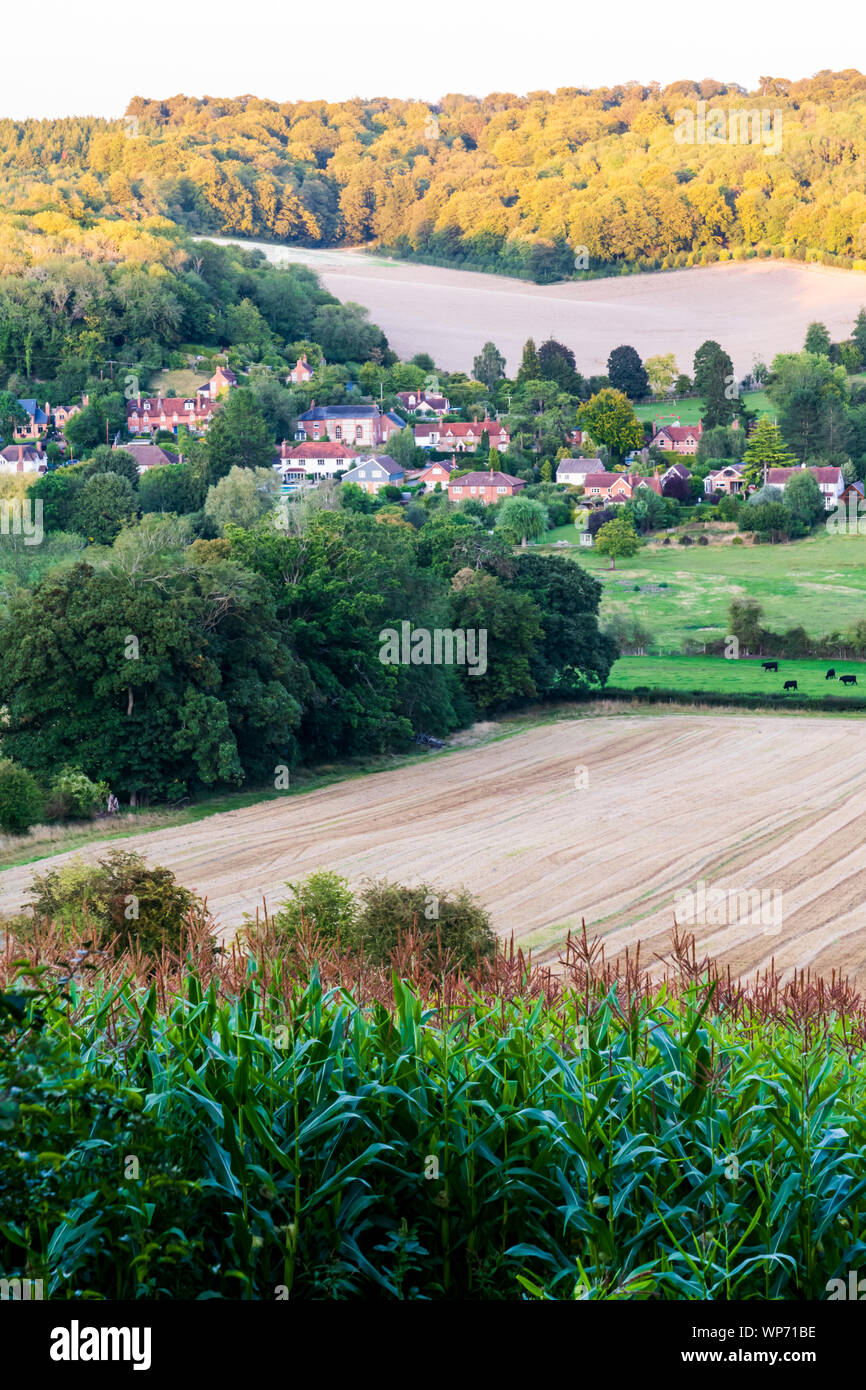 A village nestles in the Hambleden Valley in the Chilterns Stock Photo