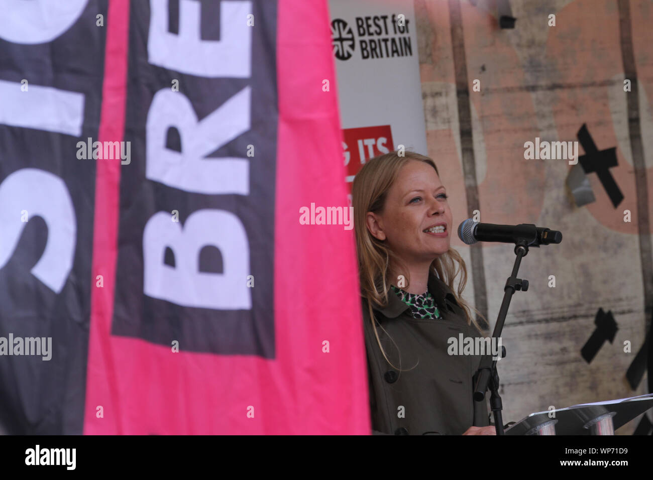 London, UK.  7 September 2019 - Sian Berry Co-leader, Green Party of England and Wales. London Assembly member,  addresses demonstrators gathered at Parliament Square for anti-Brexit rally. A couple of pro-Brexit counter-protesters attempted to disrupt the rally and provoke the anti-Brexit demonstrators by marching through the crowd holding a banner demanding the UK reverts to WTO rules.  Photos: David Mbiyu/ Alamy Live News Stock Photo