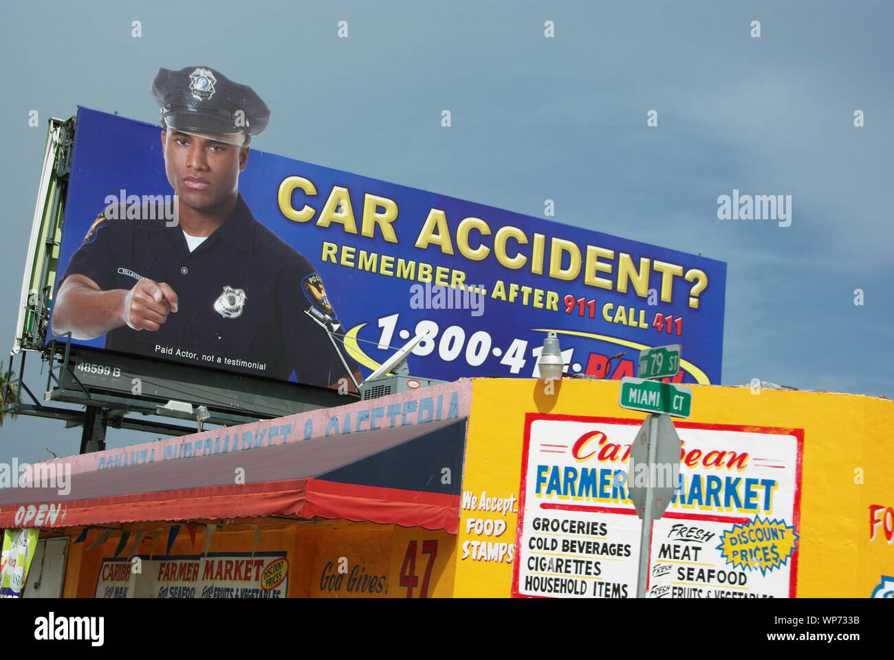 Billboard and shop advertisements on NW 79th street and NW Miami Court in Little Haiti (Miami, Florida, USA) Stock Photo