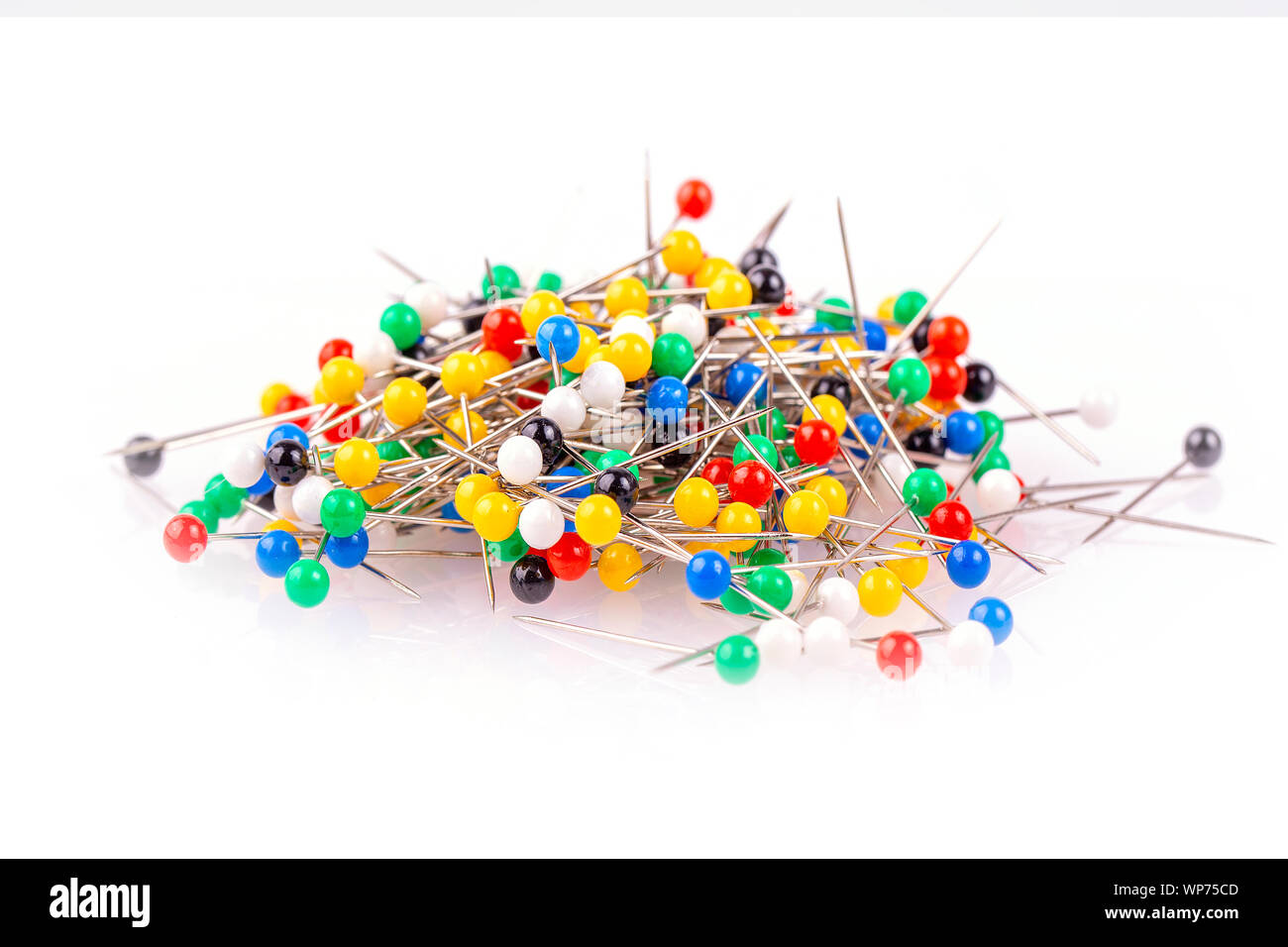 The new colored pushpins on white background Stock Photo