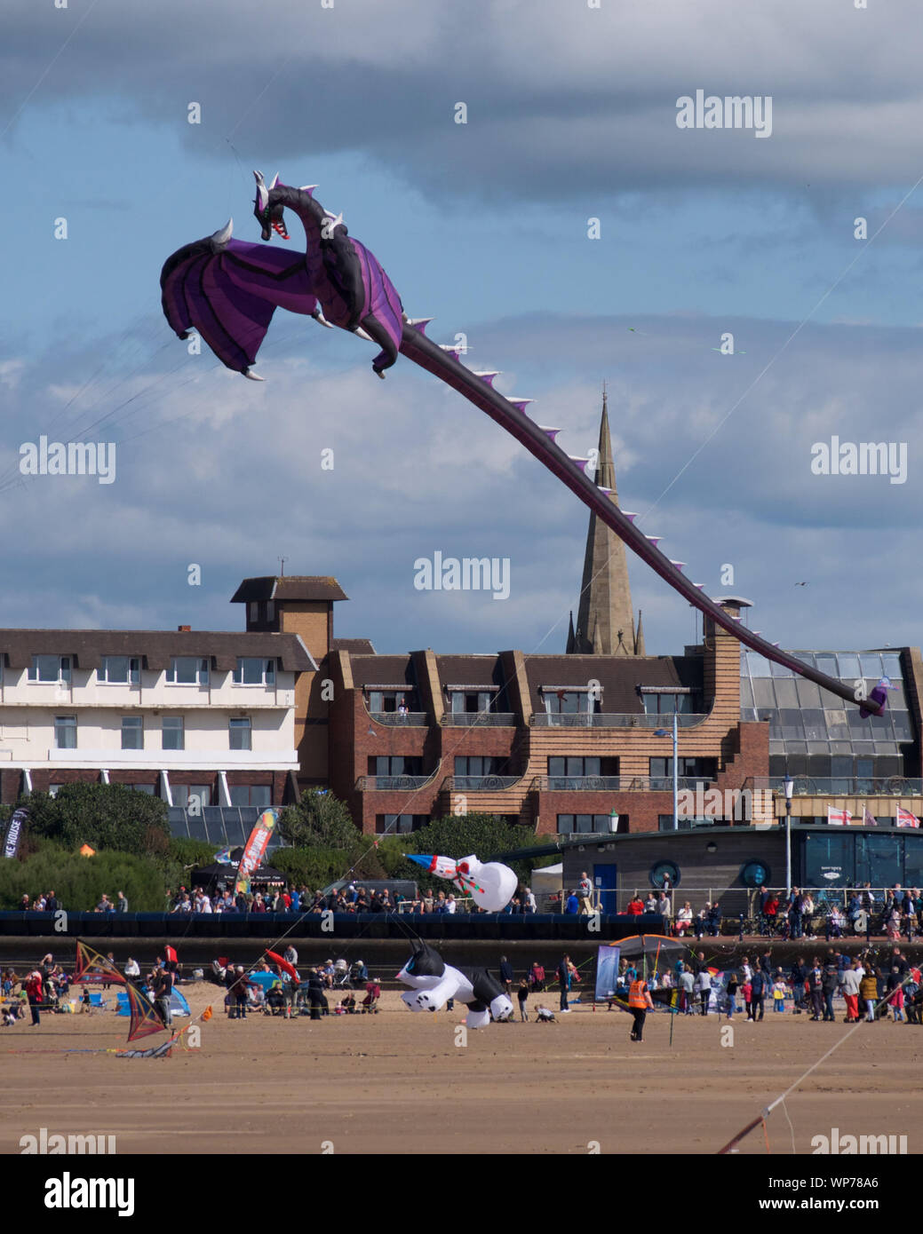 This Game of Thrones dragon was just one of hundresds of kites at the St. Annes International Kite Festival on England's Lancashire coast. Stock Photo