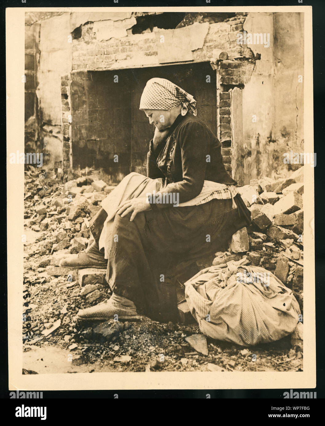 Learning of German retreat from her district, French woman returns to find her home a heap of ruins Stock Photo