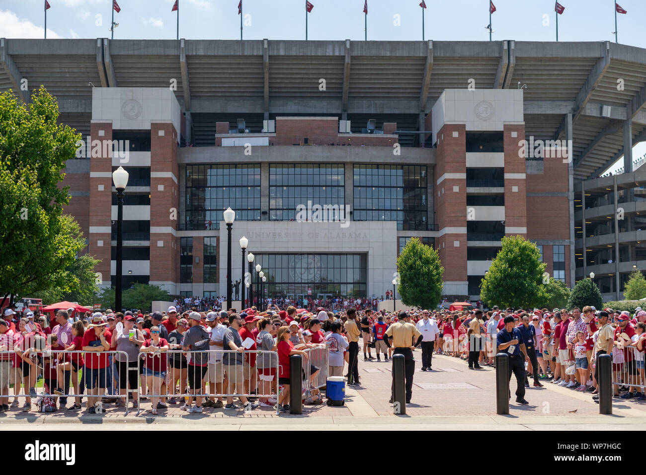 Tuscaloosa, Alabama, USA. 7th Sep, 2019. Fans line both sides of the main entrance to Bryant Denny Stadium in Tuscaloosa, Alabama waiting for the players to arrive. Despite temperatures in the 90's, a huge crowd was on hand for the Alabama vs New Mexico game on Saturday, September 7th, 2019. (Credit Image: © Tim ThompsonZUMA Wire) Stock Photo