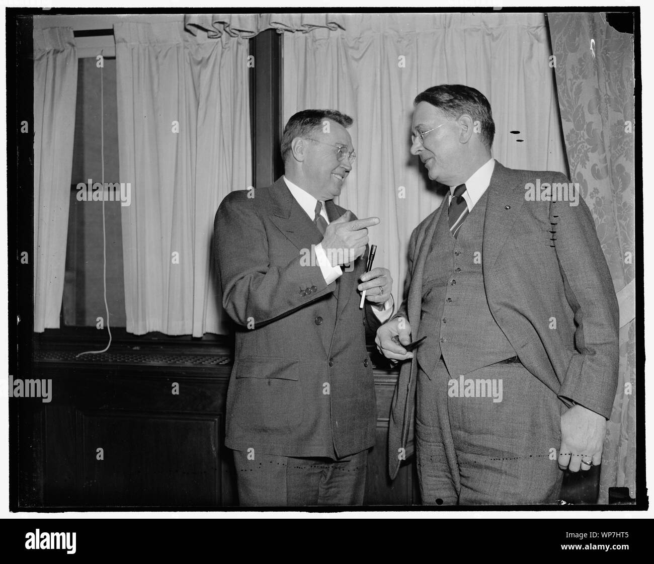 Left to right: W.K. Gunther of Gaffney, So. Car. Pres. & [...] Treas. of Dery Damask Mills Chairman of Wage & Hour Committee. Jim Daly of Columbus, Ohio. United Com'l Travelers, Chairman of Loans to Small Business. Small Business Mens Conference, 2/3/38 Stock Photo