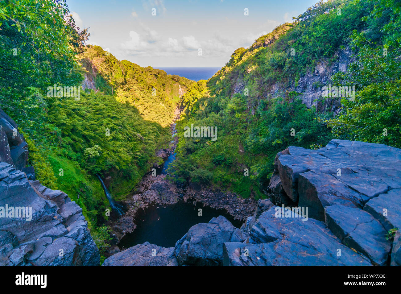 Overlooking a lush valley with waterfalls on the Road to Hana, Maui, Hawaii, USA Stock Photo