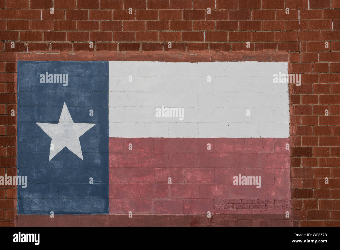 Likeness of the Texas Lone Star state flag, painted on the bricks of a building in Cisco, Texas Stock Photo