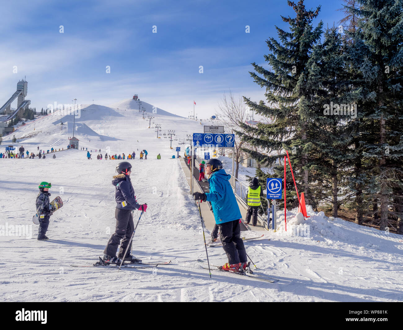 CALGARY, CANADA - MAR 1: Kids learning to ski at Canada Park on March 1, 2015 in Calgary, Alberta Canada. Visible are toddlers in a pre-school skiing Stock Photo