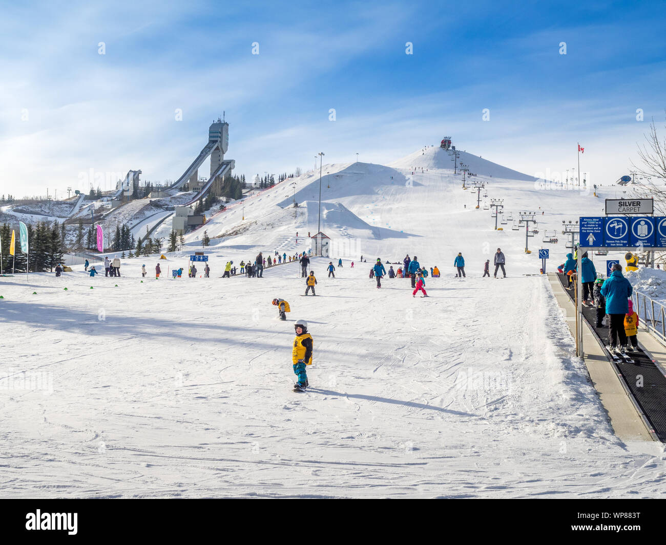 CALGARY, CANADA - MAR 1: Kids learning to ski at Canada Park on March 1, 2015 in Calgary, Alberta Canada. Visible are toddlers in a pre-school skiing Stock Photo