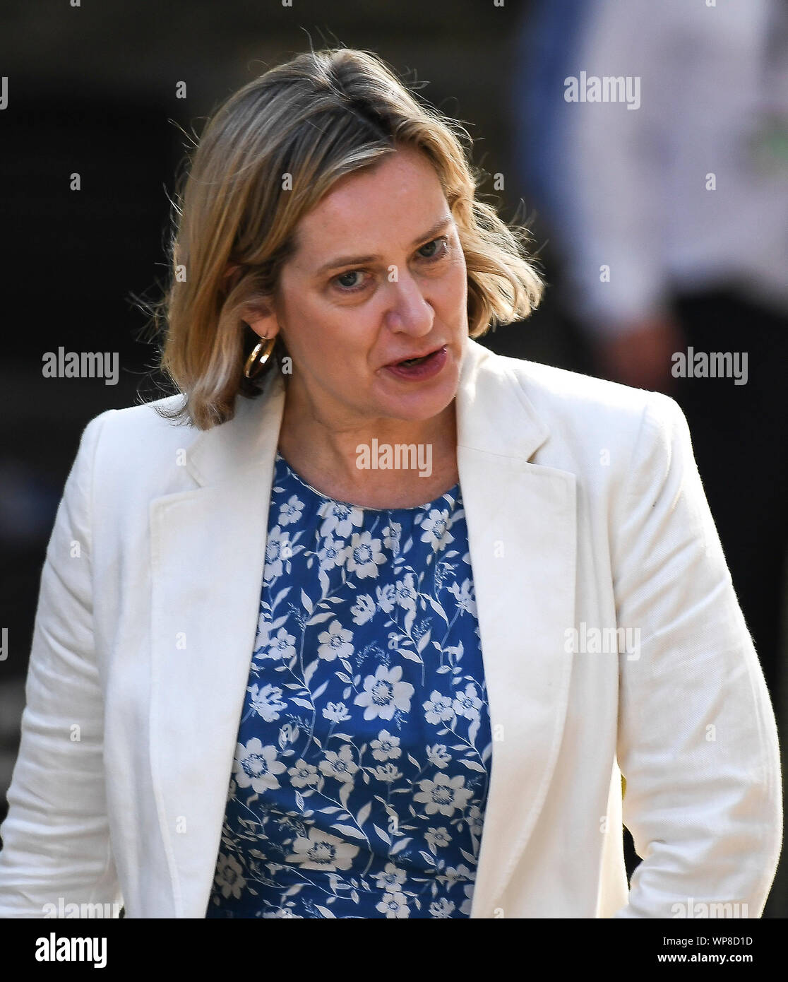 London, UK. 25th July, 2019. Photo taken on July 25, 2019 shows British Work and Pensions Secretary Amber Rudd leaving 10 Downing Street after attending a cabinet meeting in London, Britain. British Work and Pensions Secretary Amber Rudd resigned on Saturday and quitted the Conservative party, dealing one more blow to Prime Minister Boris Johnson, who is fighting an uphill battle to keep his Brexit plan intact despite strong criticism from his own party, opposition and the parliament. Credit: Han Yan/Xinhua/Alamy Live News Stock Photo