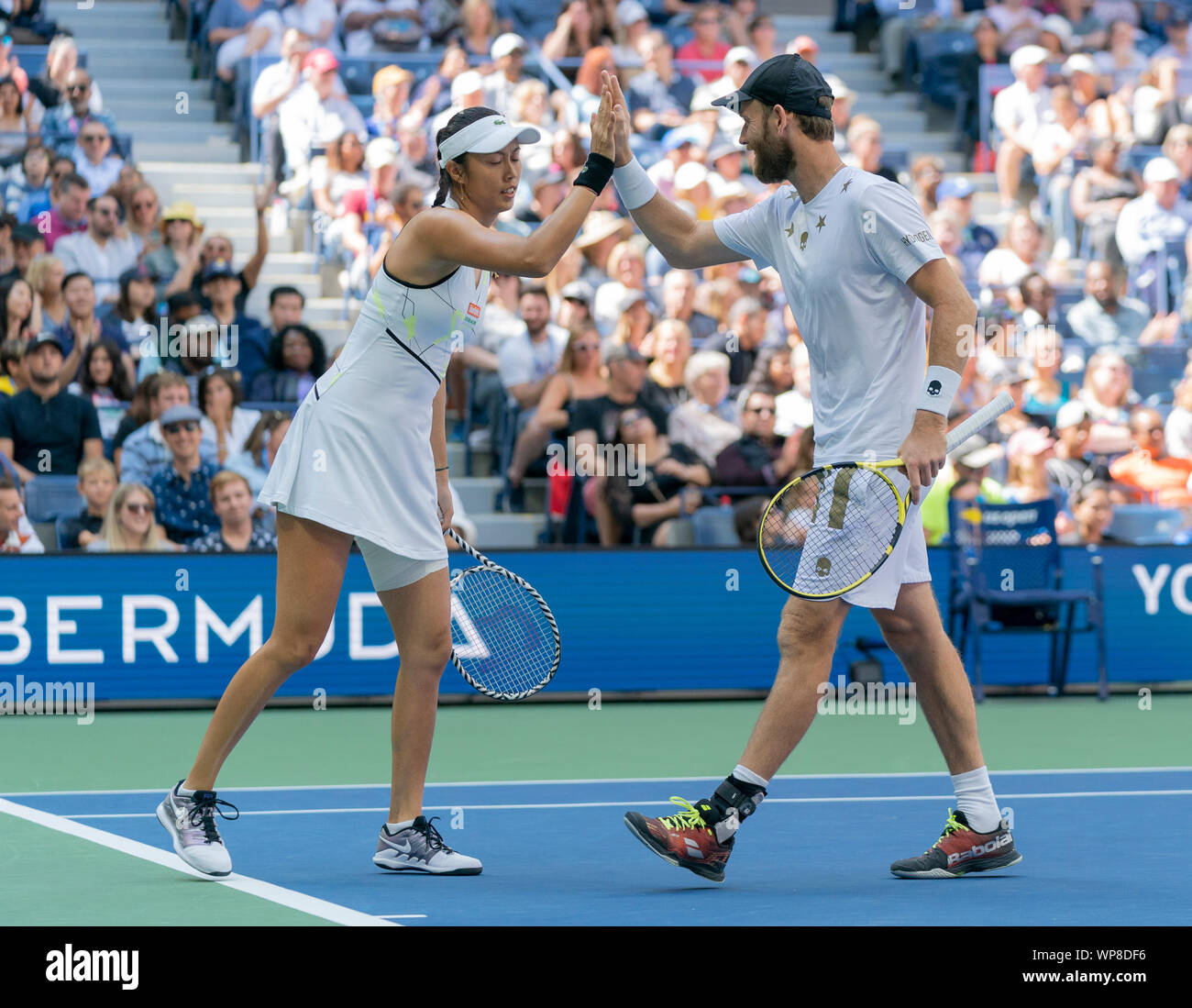 New York, NY - September 7, 2019: Hao-Ching Chan (Taipei), Michael Venus (New Zeland) in action during mixed doubles final match at US Open Championships at Billie Jean King National Tennis Center Stock Photo