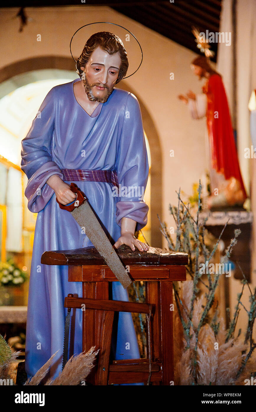 Image of Saint Joseph, working as carpenter, in the portuguese parish of Ribeira das Tainhas. Azores islands, Portugal. Stock Photo