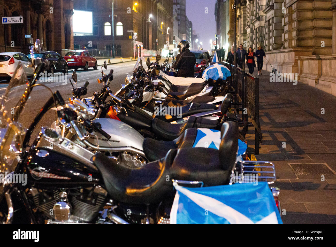 Motorbikes parked in Glasgow decorated with Scottish flags during  Scottish Independence rally in George Square, Glasgow, UK 2014 Stock Photo