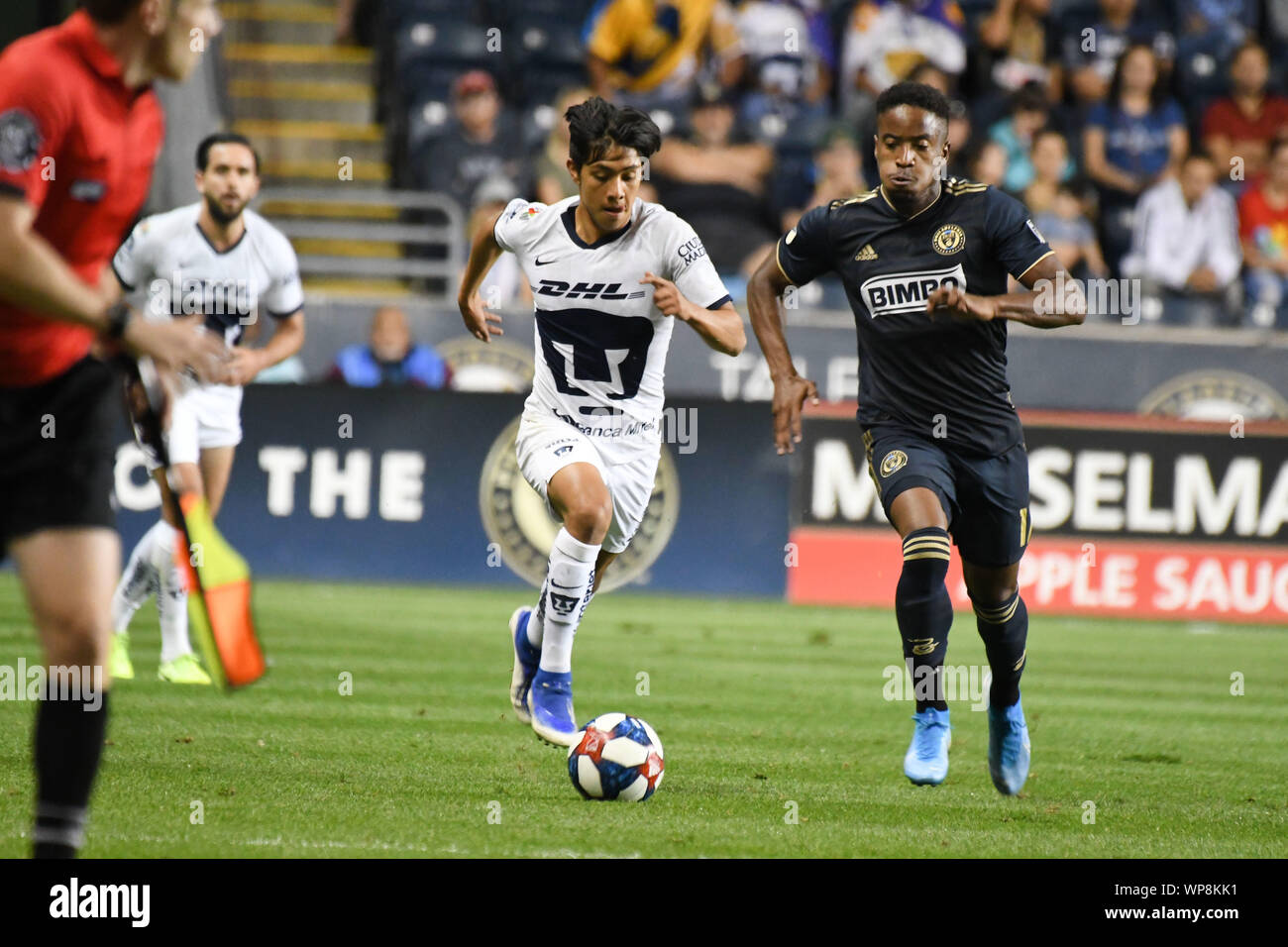 Chester, Pennsylvania, USA. 7th Sep, 2019. Pumas's IDEKEL DOMINGUEZ (20)  pushes the ball down the pitch against the Union 's SERGIO SANTOS (17) at  Talen Energy Stadium in Chester Pennsylvania during an