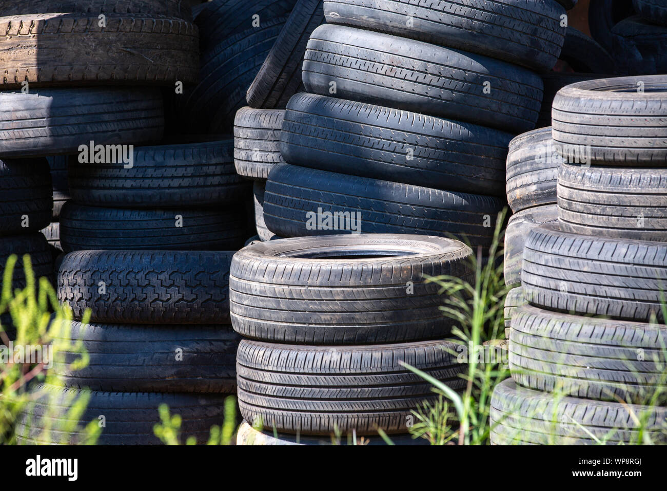 Old tires stacked, Closeup Broken tire damaged, A bunch of old tires