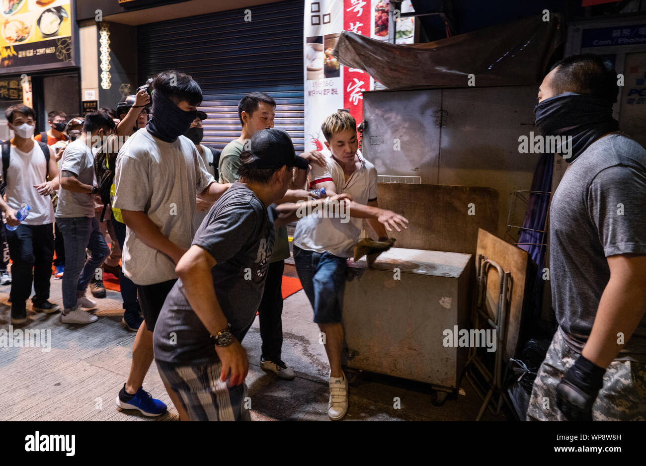 Hong Kong, China. 07th Sep, 2019. Anti-government protesters fight a man who confronted them during the demonstration.Anti-government protest continued across Hong Kong despite the withdrawal of the extradition bill. Credit: SOPA Images Limited/Alamy Live News Stock Photo