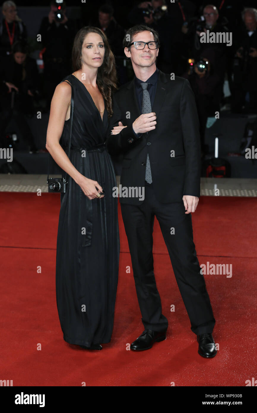 VENICE, ITALY September 06 Sean Evans (R) and a guest attend Roger