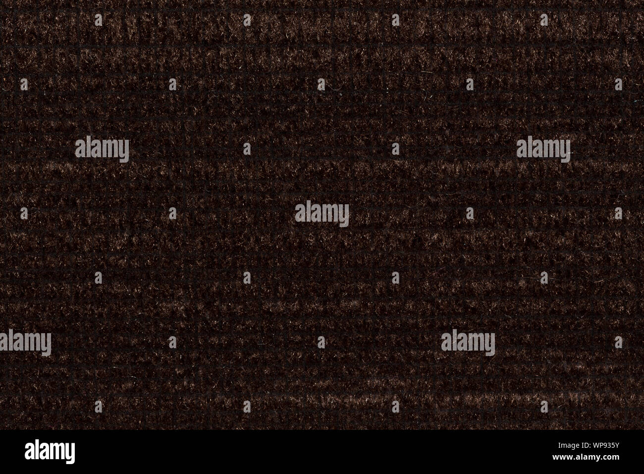 Strict textile background in awesome dark brown colour. Stock Photo