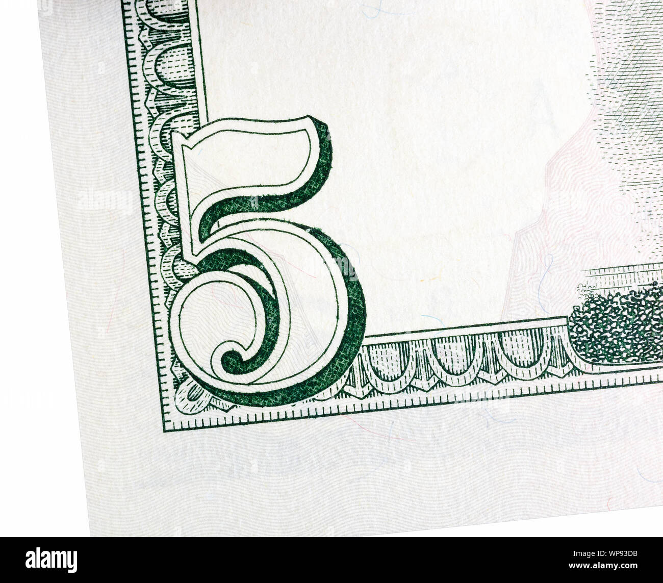 The element of five dollars bill on macro, isolated. Stock Photo