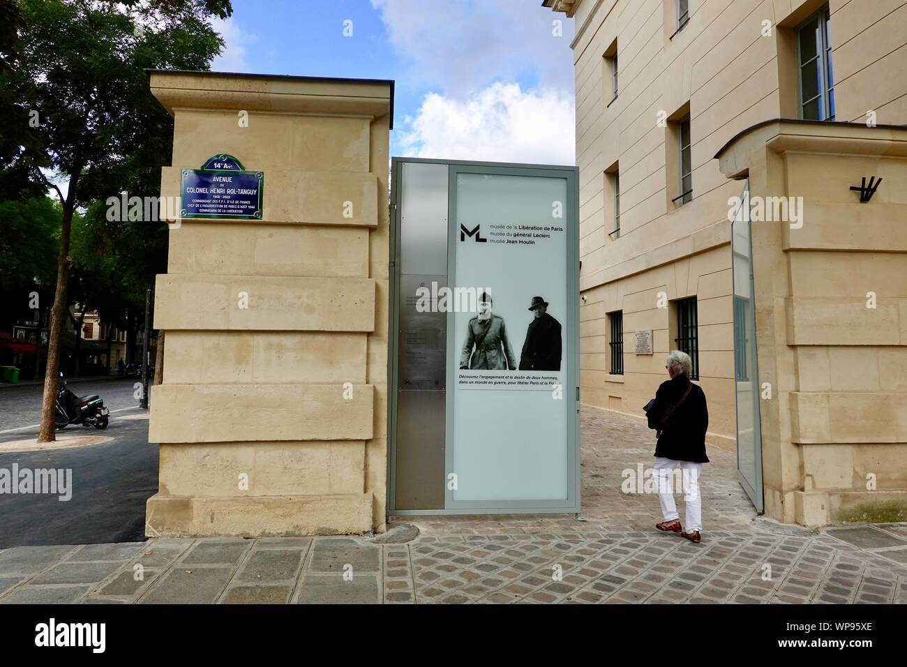 Woman walking into the new Liberation of Paris Museum near Place Denfert-Rochereau. It opened its doors on the 75th anniversary. Paris, France. Stock Photo