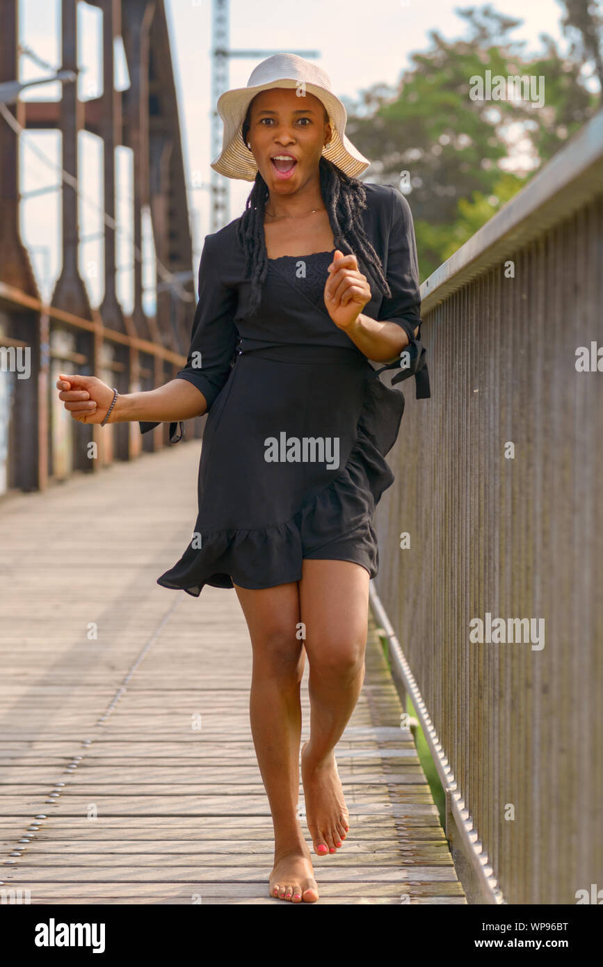 Laughing fun loving young African woman 