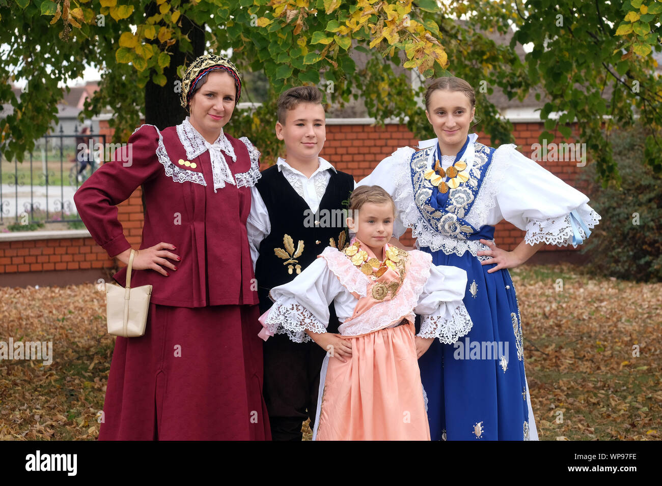 People dressed in folk costumes go to the church at the Mass on  Thanksgiving day in Stitar, Croatia Stock Photo - Alamy