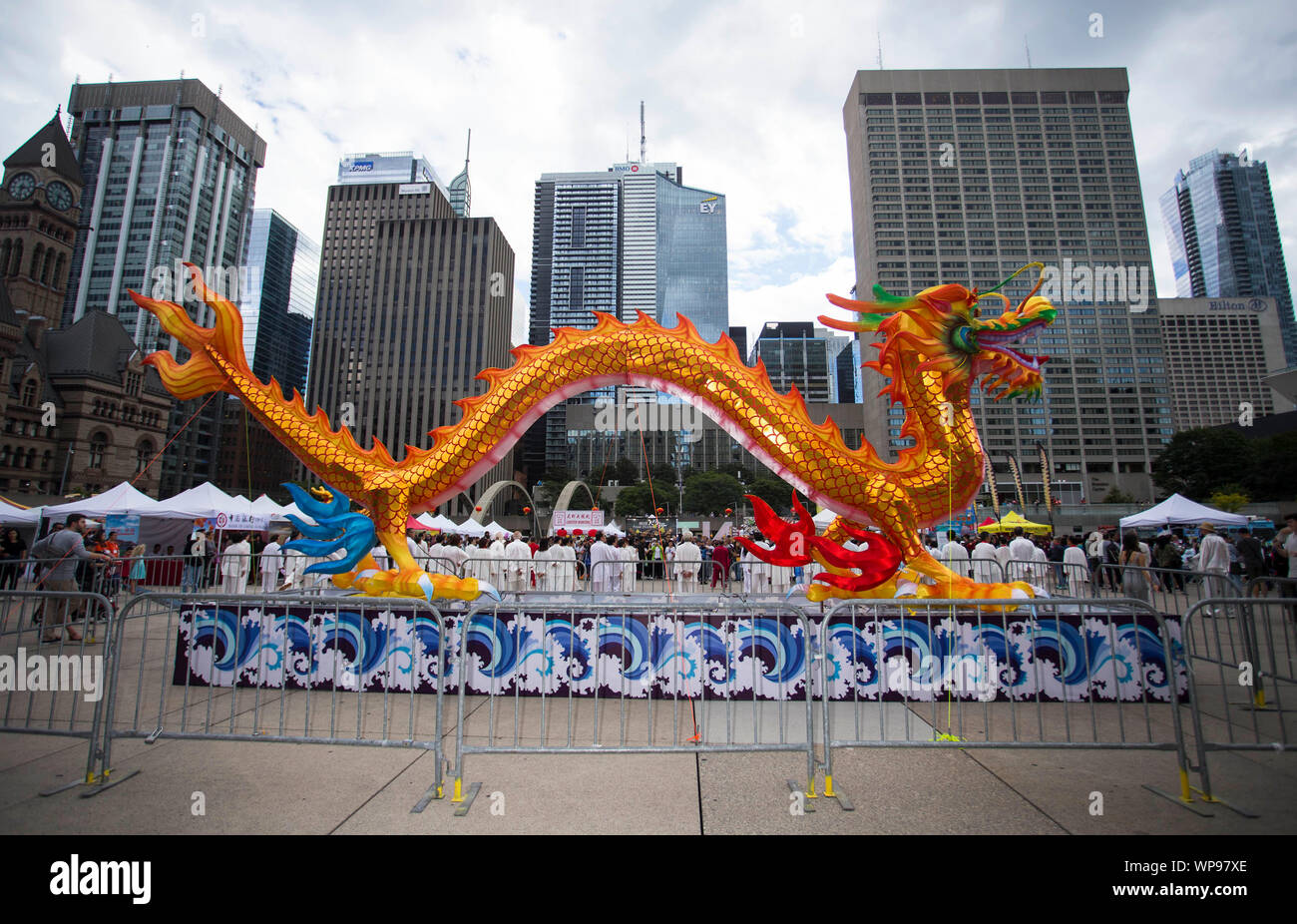 Toronto, Canada. 7th Sep, 2019. A giant-sized inflatable Chinese dragon is seen during the Toronto Dragon Festival 2019 at the Nathan Phillips Square in Toronto, Canada, Sept. 7, 2019. The Toronto Dragon Festival 2019, which kicked off Friday at the Nathan Phillips Square in front of the Toronto City Hall, is catching the eyes of thousands of tourists and local residents. Partially funded and supported by the Government of Canada, the three-day 2019 Toronto Dragon Festival is hosted by the Canadian Association of Chinese Performing Arts. Credit: Zou Zheng/Xinhua Stock Photo