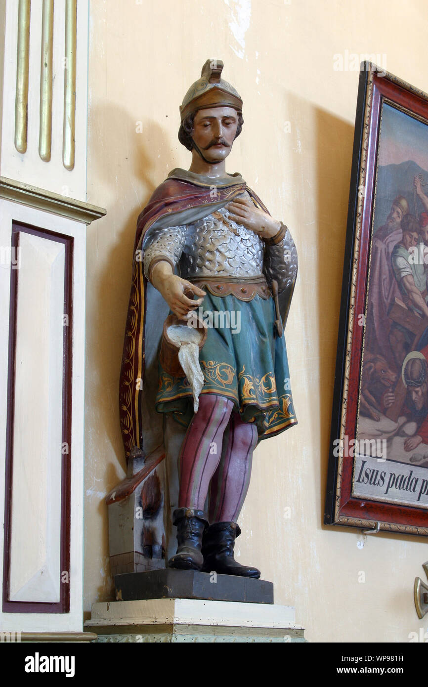 Saint Florian, statue on the altar of the Adoration of the Magi in the church of Holy Trinity in the Barilovicki Cerovac, Croatia Stock Photo