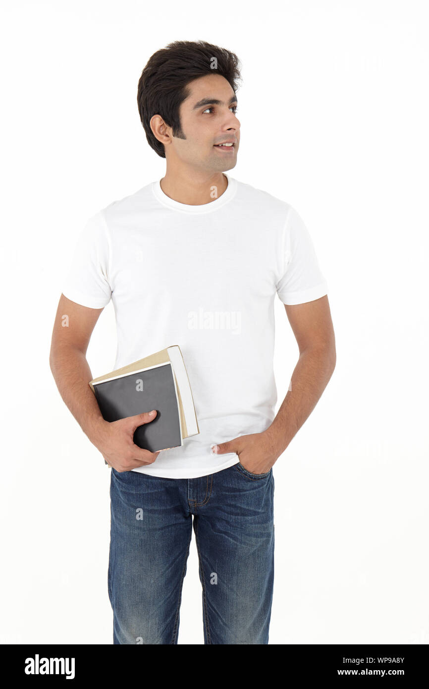 College student holding textbooks Stock Photo Alamy