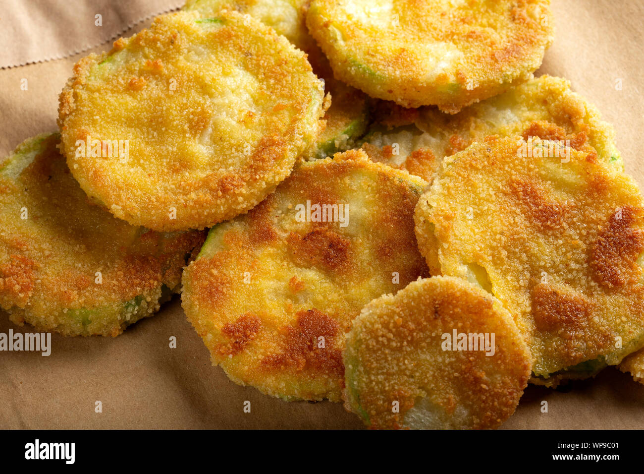 Fried slices of zucchini on paper Stock Photo