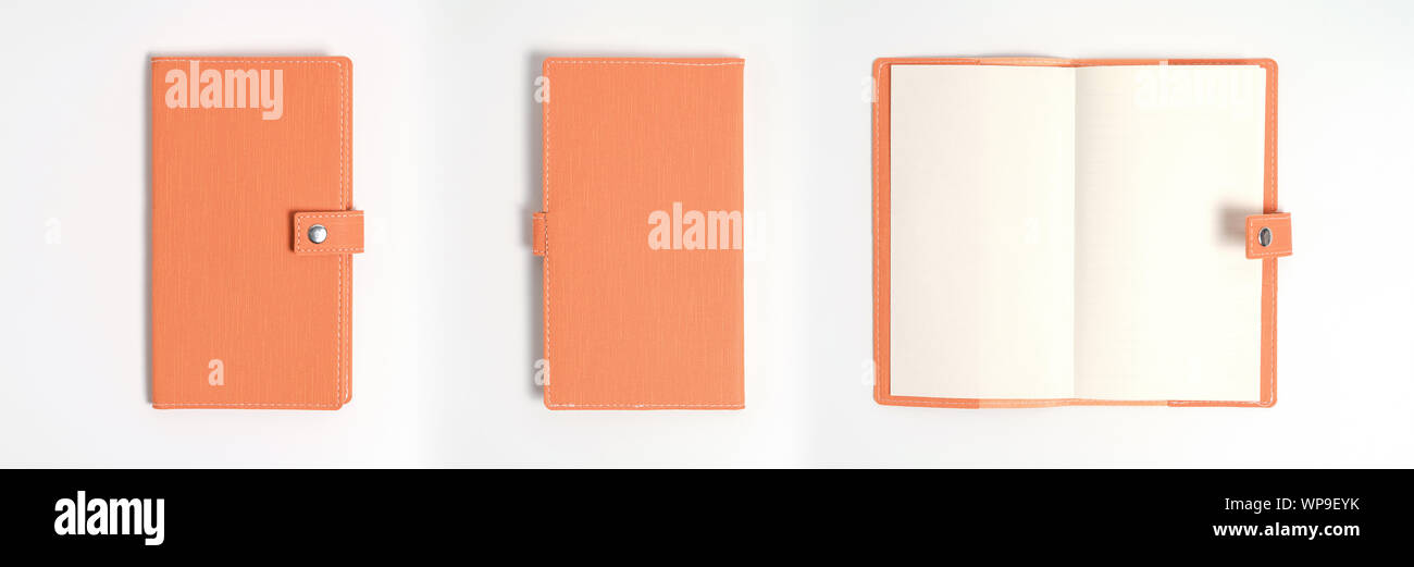 top view blank orange leather diary on white desk Stock Photo