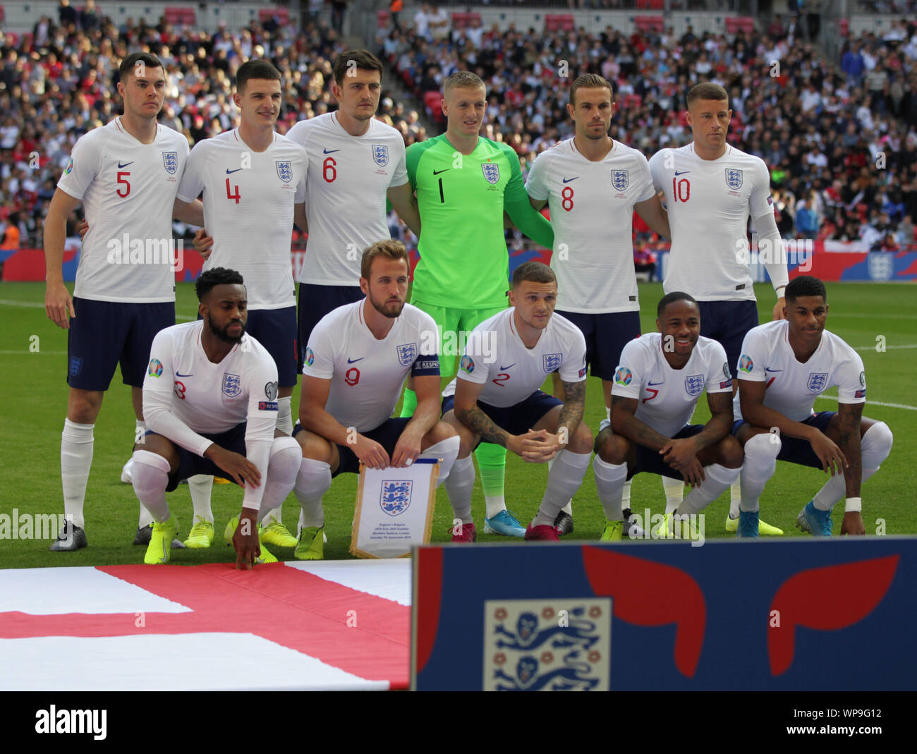 LONDON, ENGLAND. SEPTEMBER 07: England Team Shoot Back Row:- Michael Keane, Declan Rice, Harry Maguire, Jordan Pickford, Jordan Henderson and Ross Bar Stock Photo