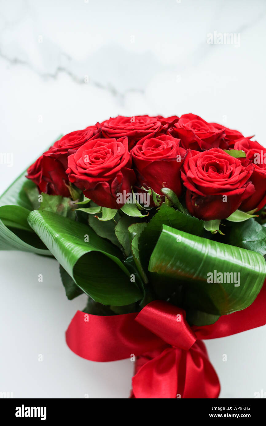 Gift For Her, Romantic Relationship And Floral Design Concept - Luxury  Bouquet Of Red Roses, Beautiful Flowers As Holiday Love Present On  Valentines Day Stock Photo, Picture and Royalty Free Image. Image 132409785.
