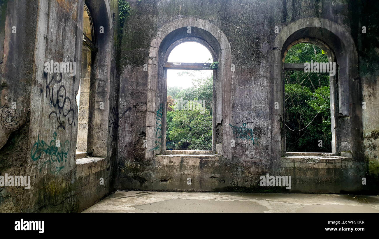 An empty space inside an old, ruined building Stock Photo - Alamy