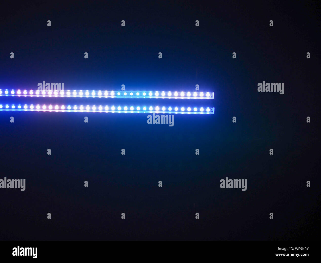 close up on blue LED light in black background Stock Photo - Alamy