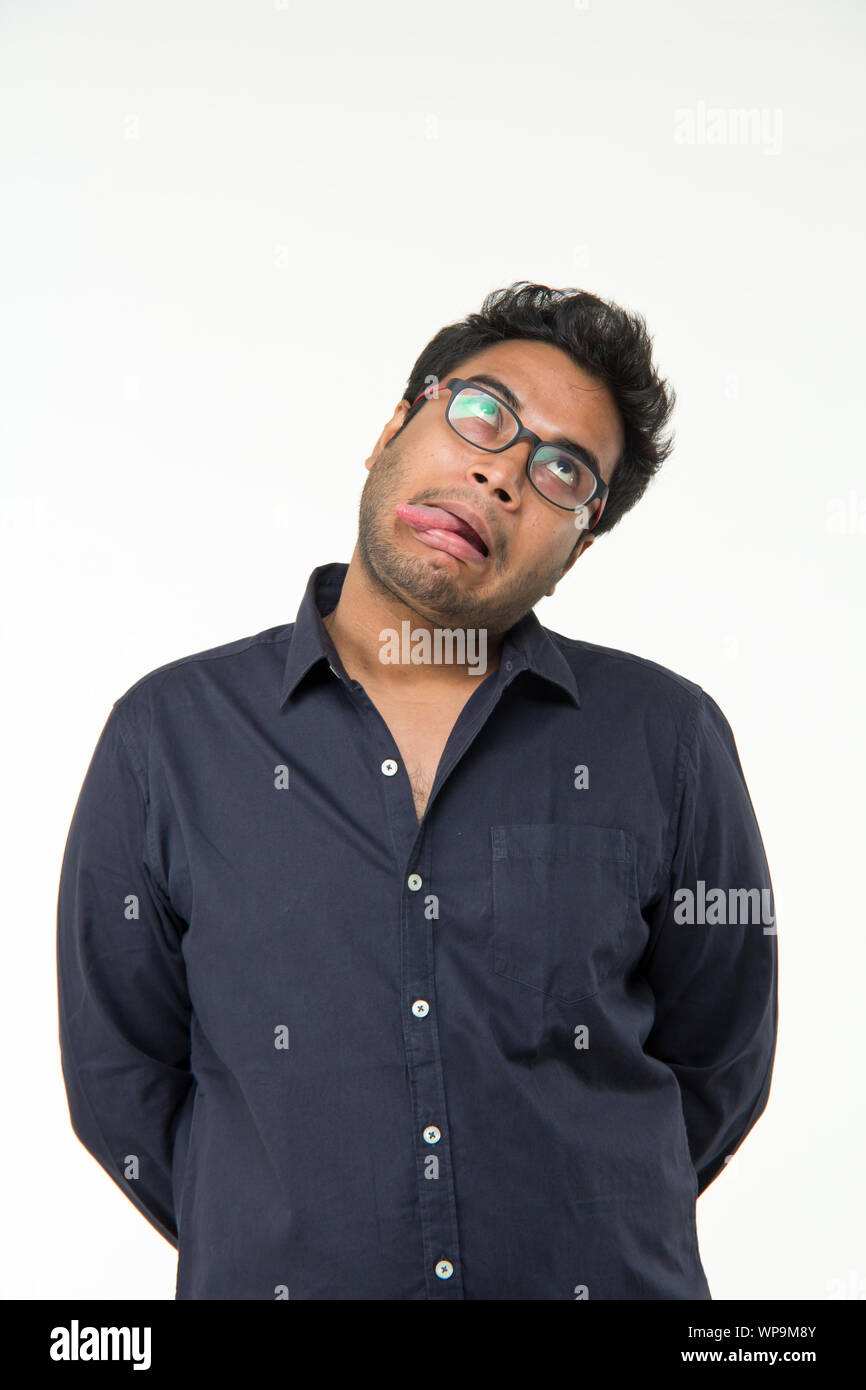 Frustrated young man pretending to be hang to death Stock Photo