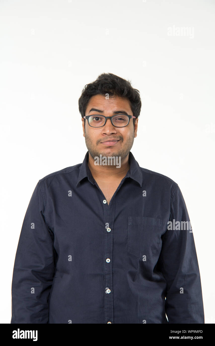 Portrait of a young man smirking Stock Photo