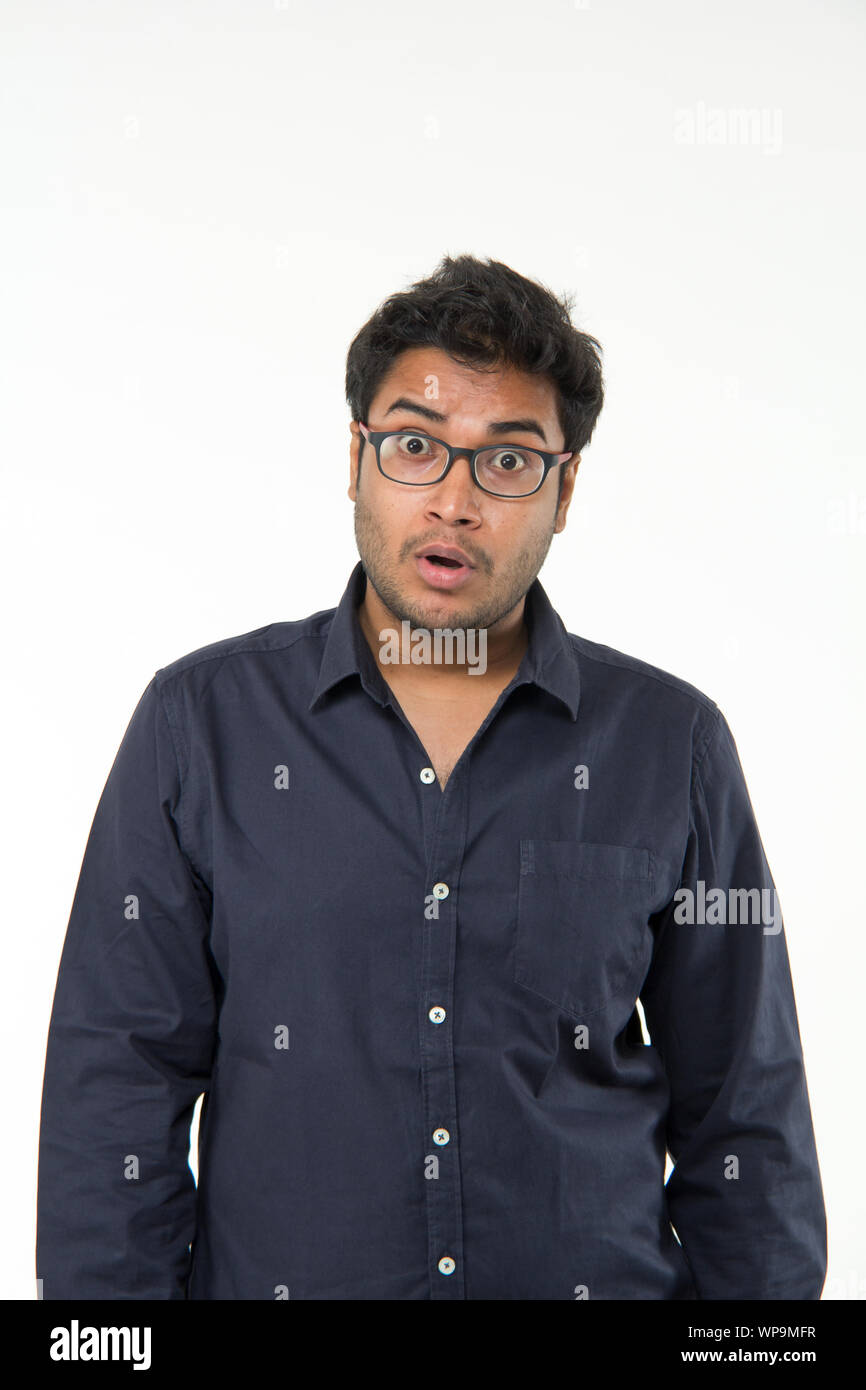 Young man looking shocked Stock Photo